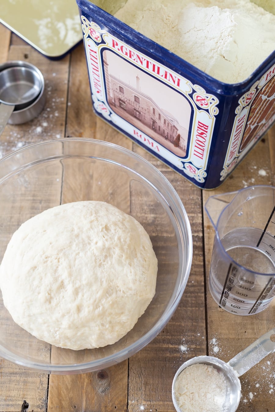 Pizza dough ball, water, flour.