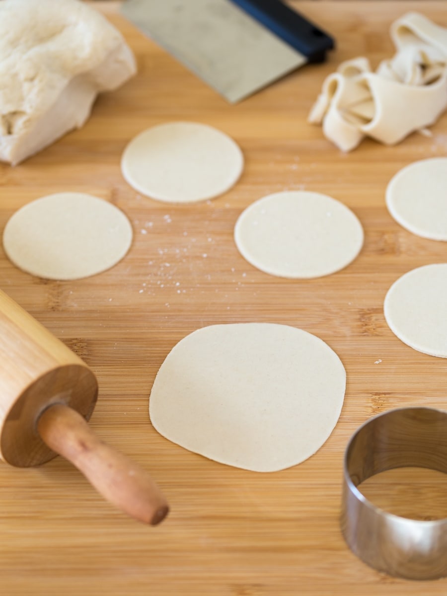 Rolling out pierogi dough.