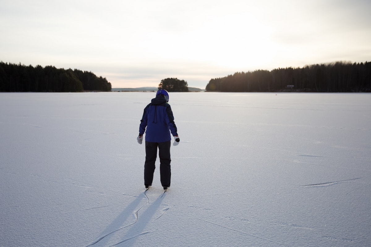 Ice skating on frozen lakes in Sweden