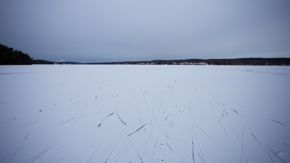 Ice skating on frozen lakes in Sweden