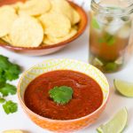 A blended salsa infused with garlic is the ultimate dip for your nacho chips.
