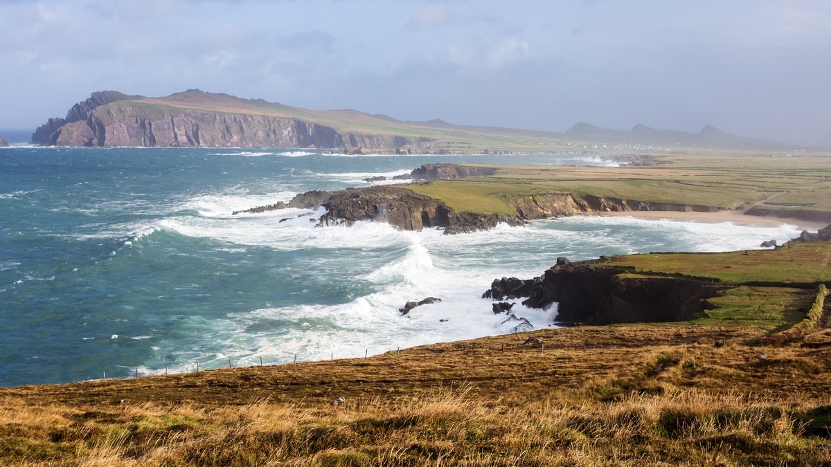 Atlantic coast of Ireland, waves crashing against low cliffs.