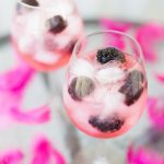 Blackberry gin and tonic with pink tonic water