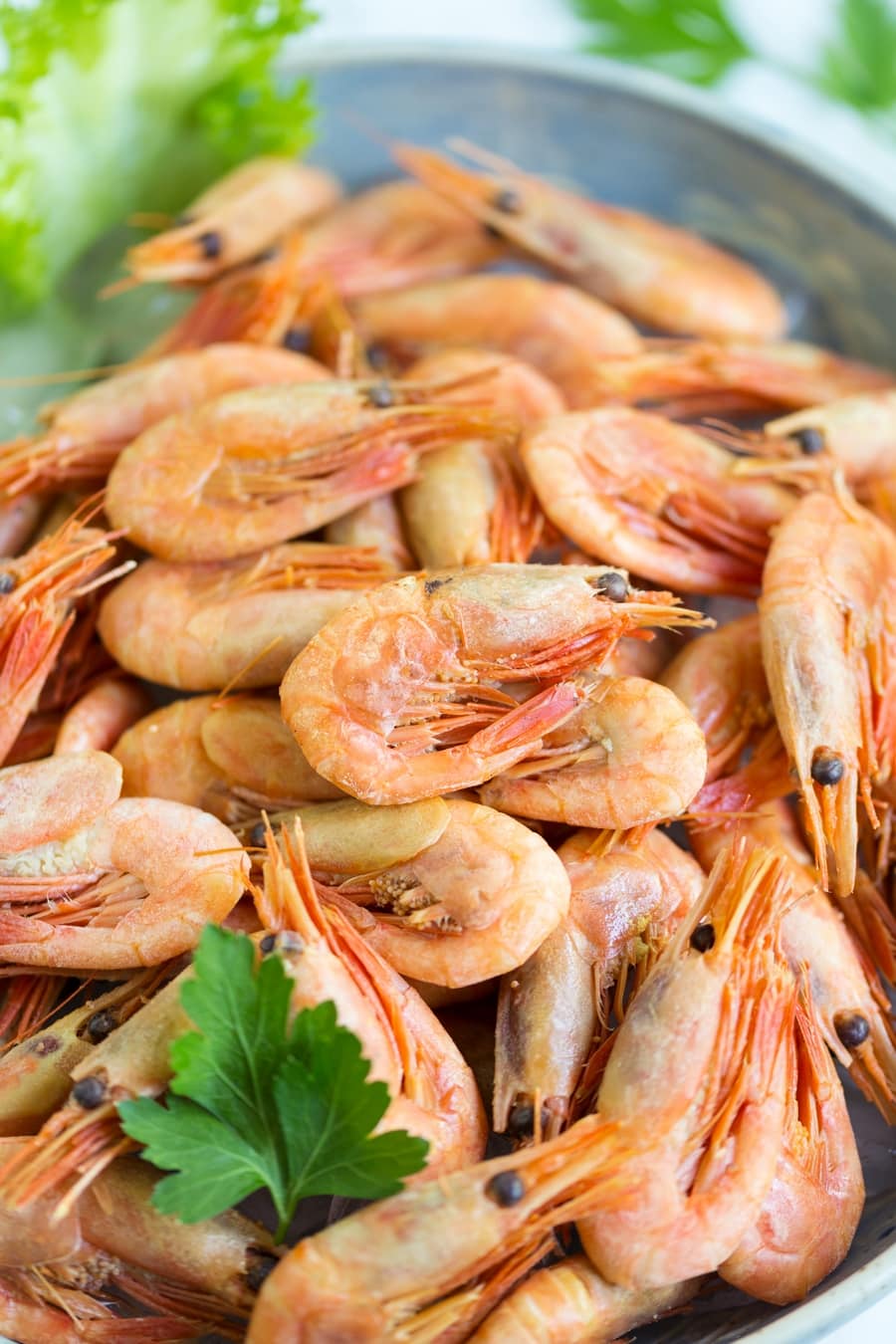 Closeup of smoked shrimps in a bowl.