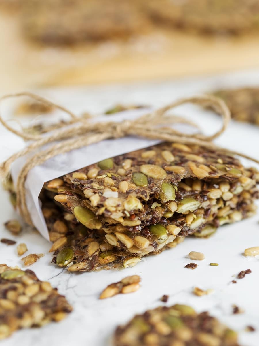 Closeup of stacked, packaged multi seed crackers.