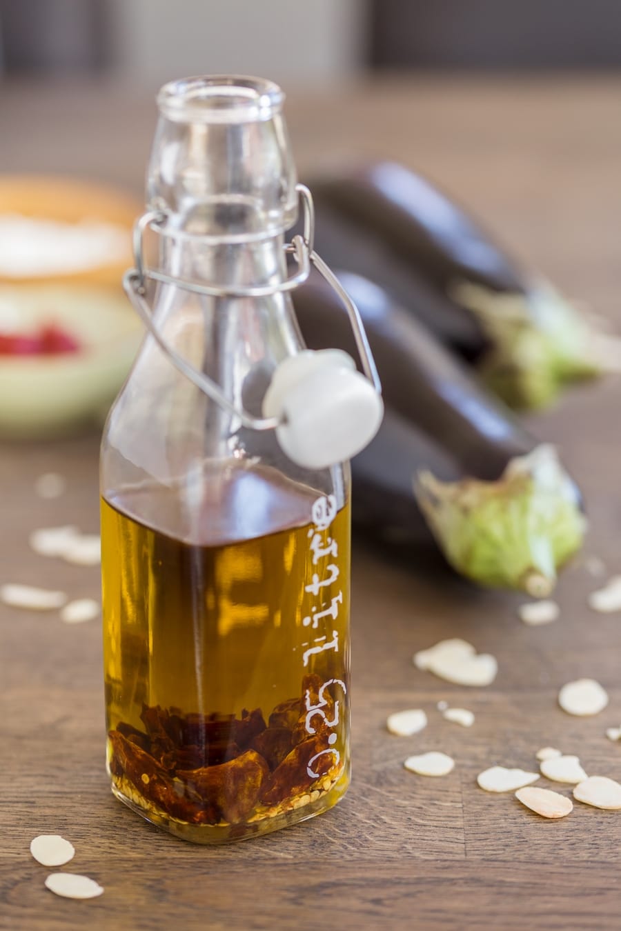 Italian chili oil in a glass bottle.
