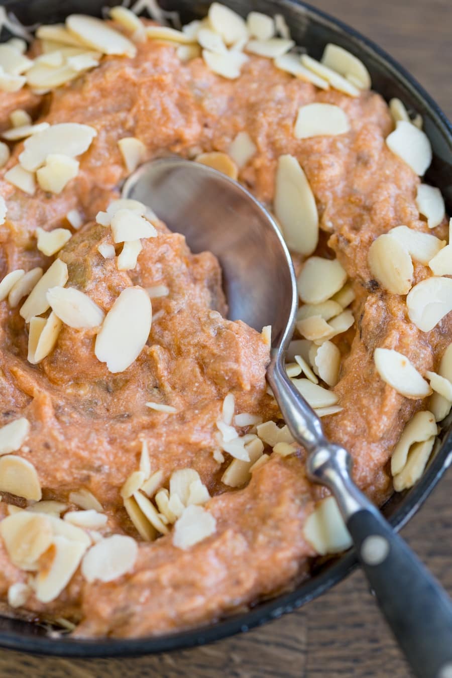 Eggplant ricotta dip garnished with roasted shaved almonds.