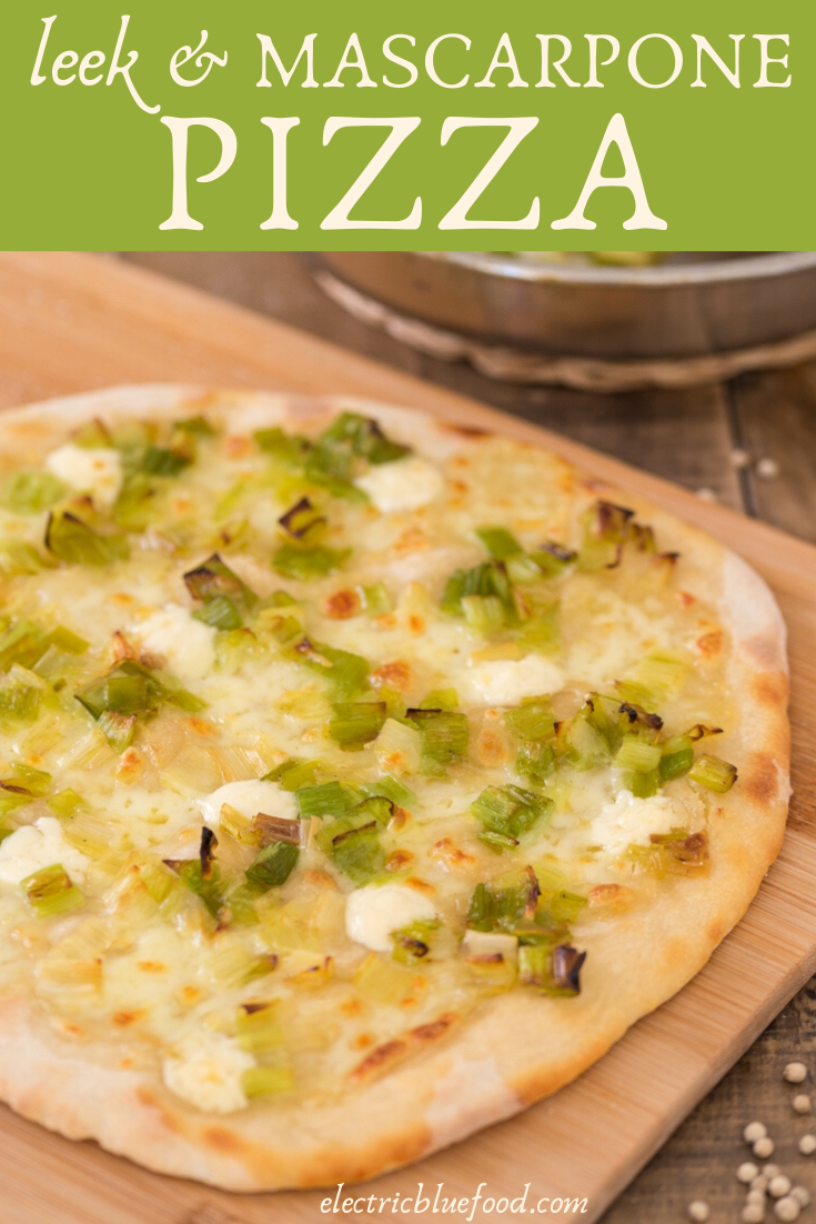 Leek mascarpone pizza bianca: an unusual pizza topping for a delicious homemade pizza. No tomato sauce but good olive oil and puddles of melted mascarpone cheese that perfectly pair with sautéed leeks with white pepper.