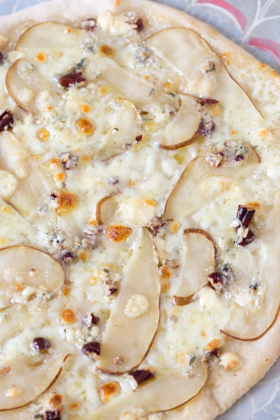 Detail of pear blue cheese pizza topping.