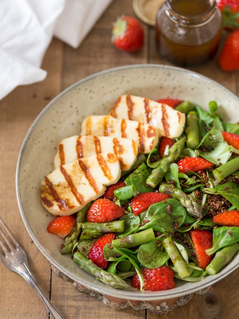Halloumi asparagus salad with strawberries and quinoa.
