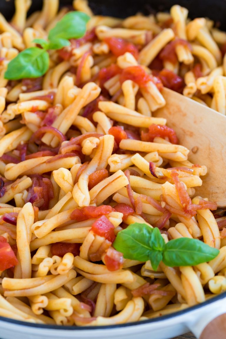 Closeup of tomato pasta with balsamico onion sauce.
