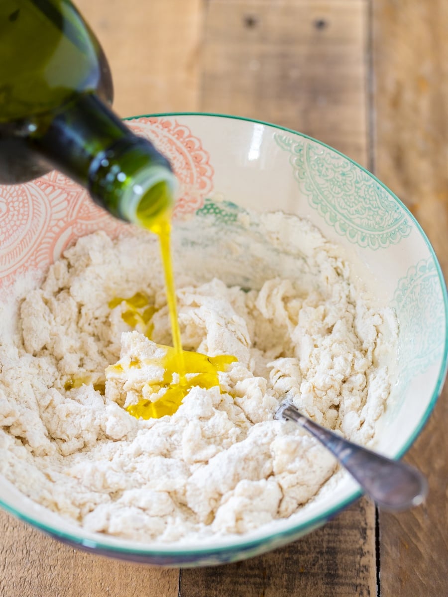 Olive oil added to flatbread dough.
