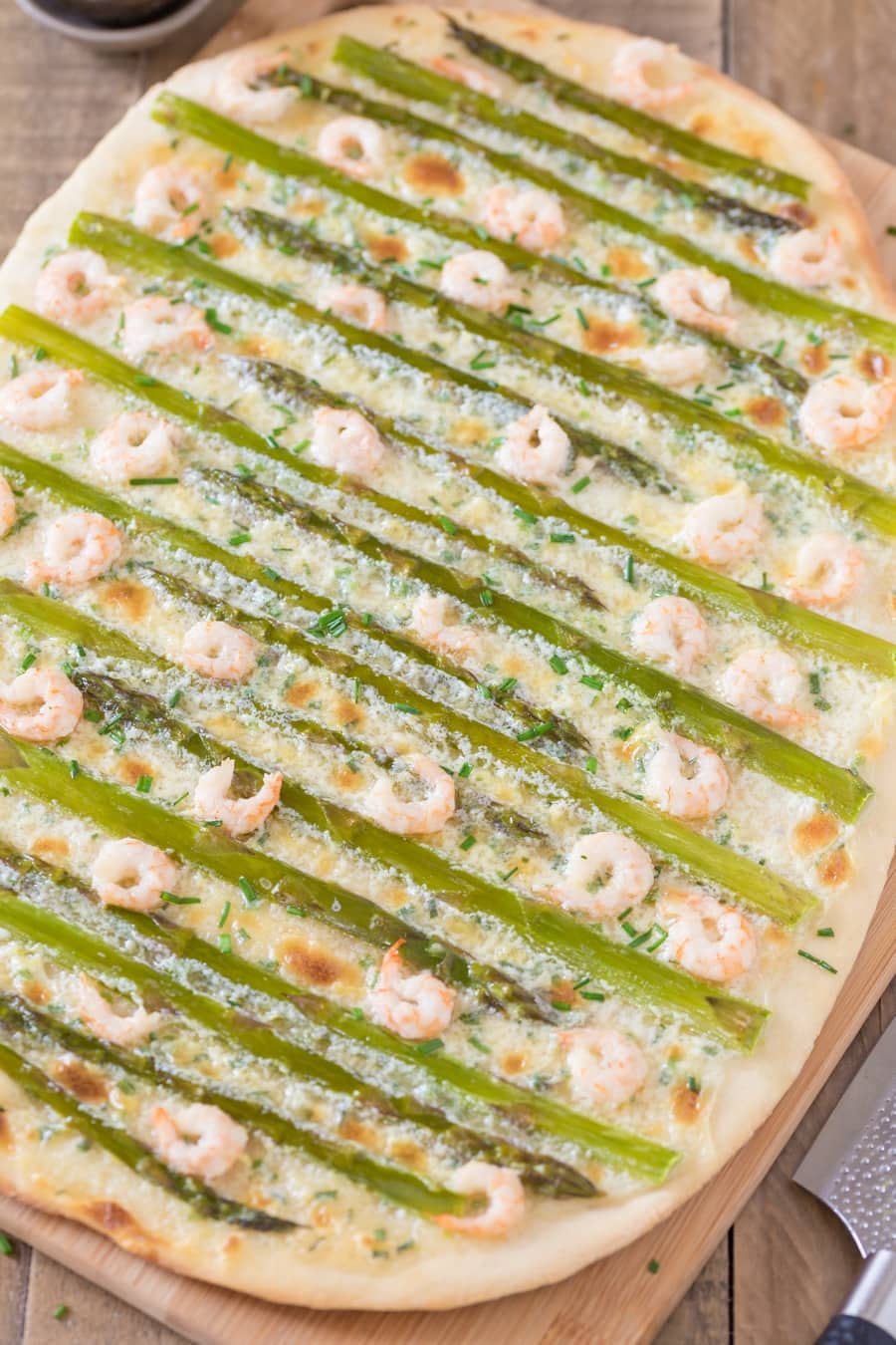 Shrimp asparagus flatbread with zesty mascarpone sauce.