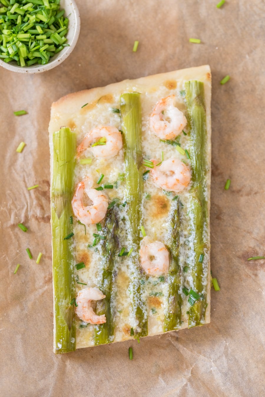 Sliced shrimp asparagus flatbread with zesty mascarpone sauce.