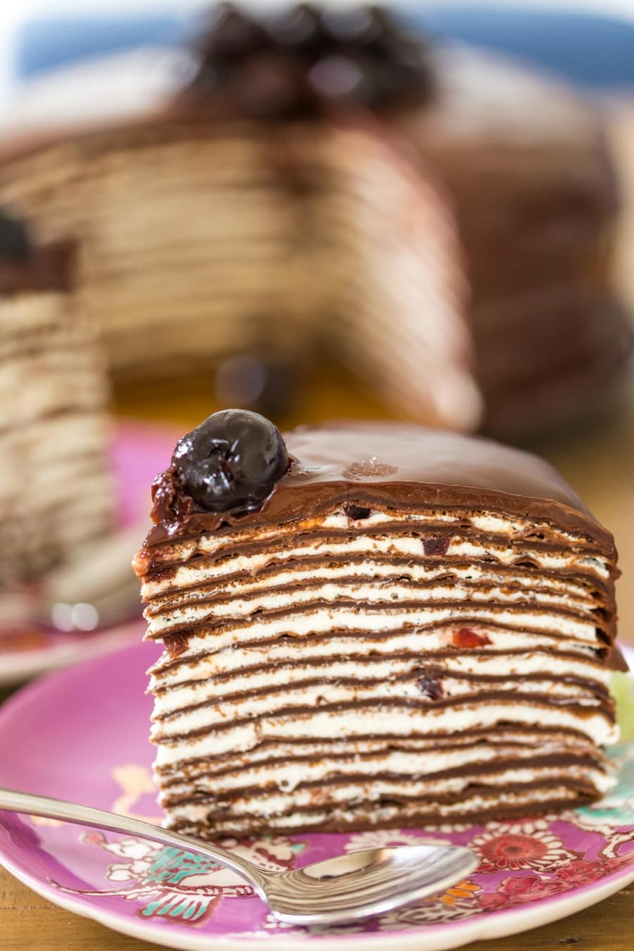 Slice of Black forest crepe cake.