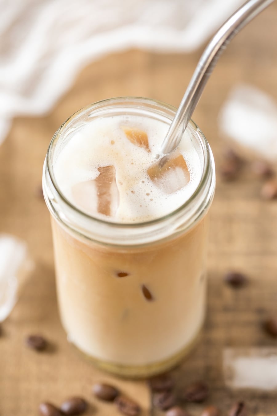Glass of cardamom cold brew iced latte.