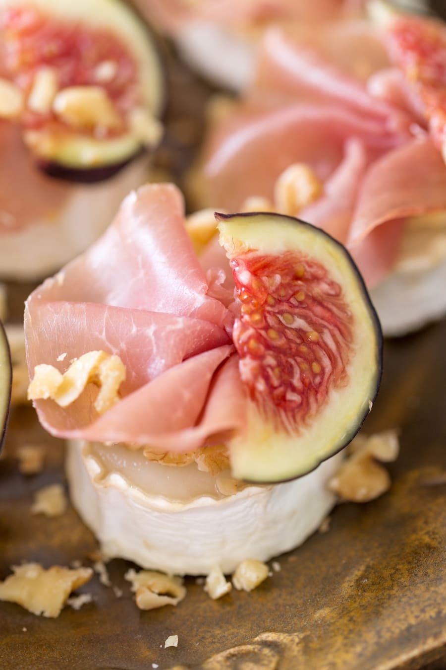 Baked chevre bits with figs and prosciutto.