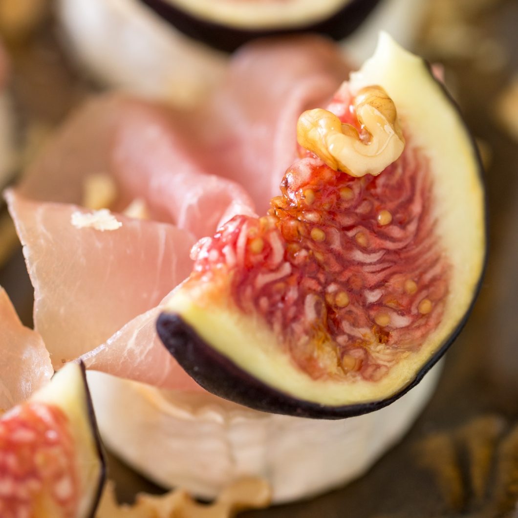 Baked chevre bits with fresh figs, walnuts and prosciutto.