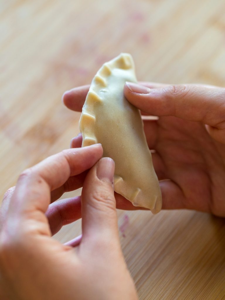 Piching a pierogi closed.