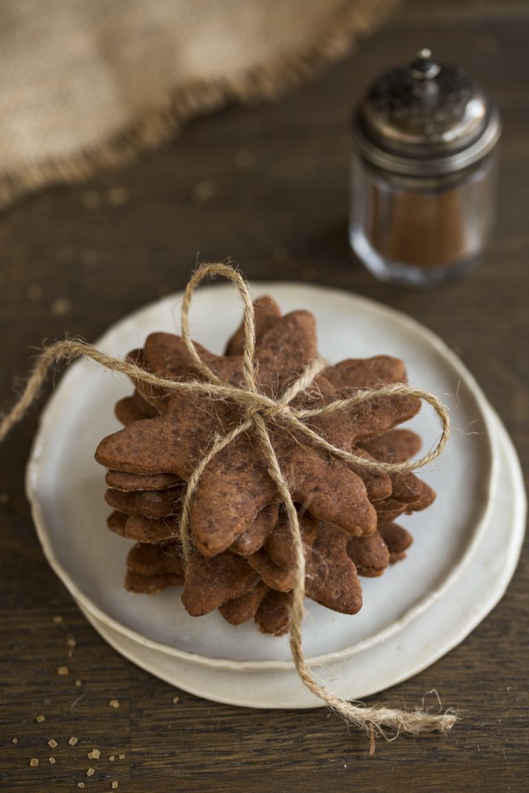 Stacked ginger thins in the form of a snowflake.
