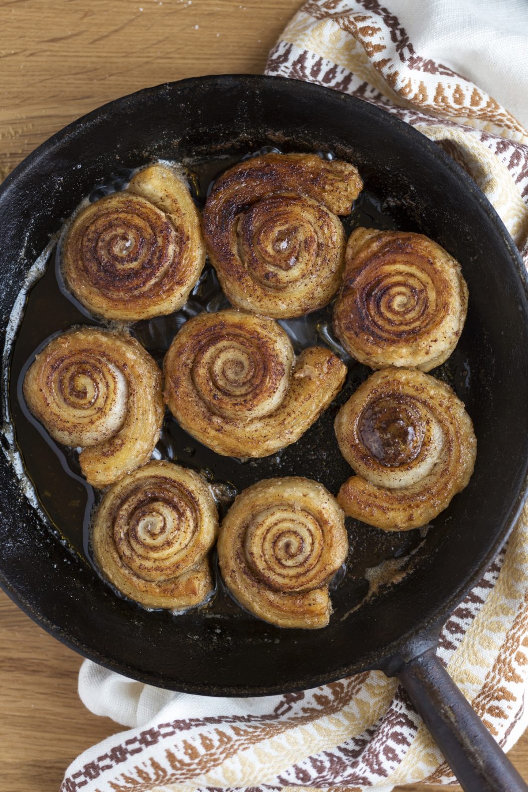Skillet cinnamon rolls with puff pastry made on the stovetop.