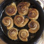 Skillet cinnamon rolls with puff pastry made on the stovetop.
