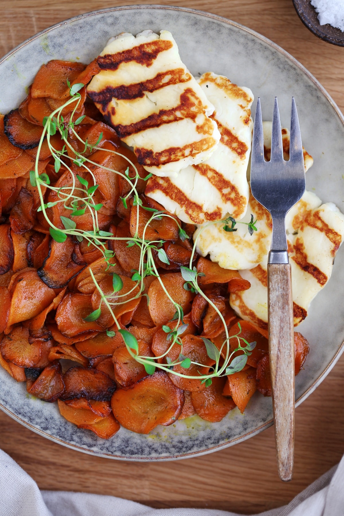 Sauteed carrots served as side dish to grilled halloumi.