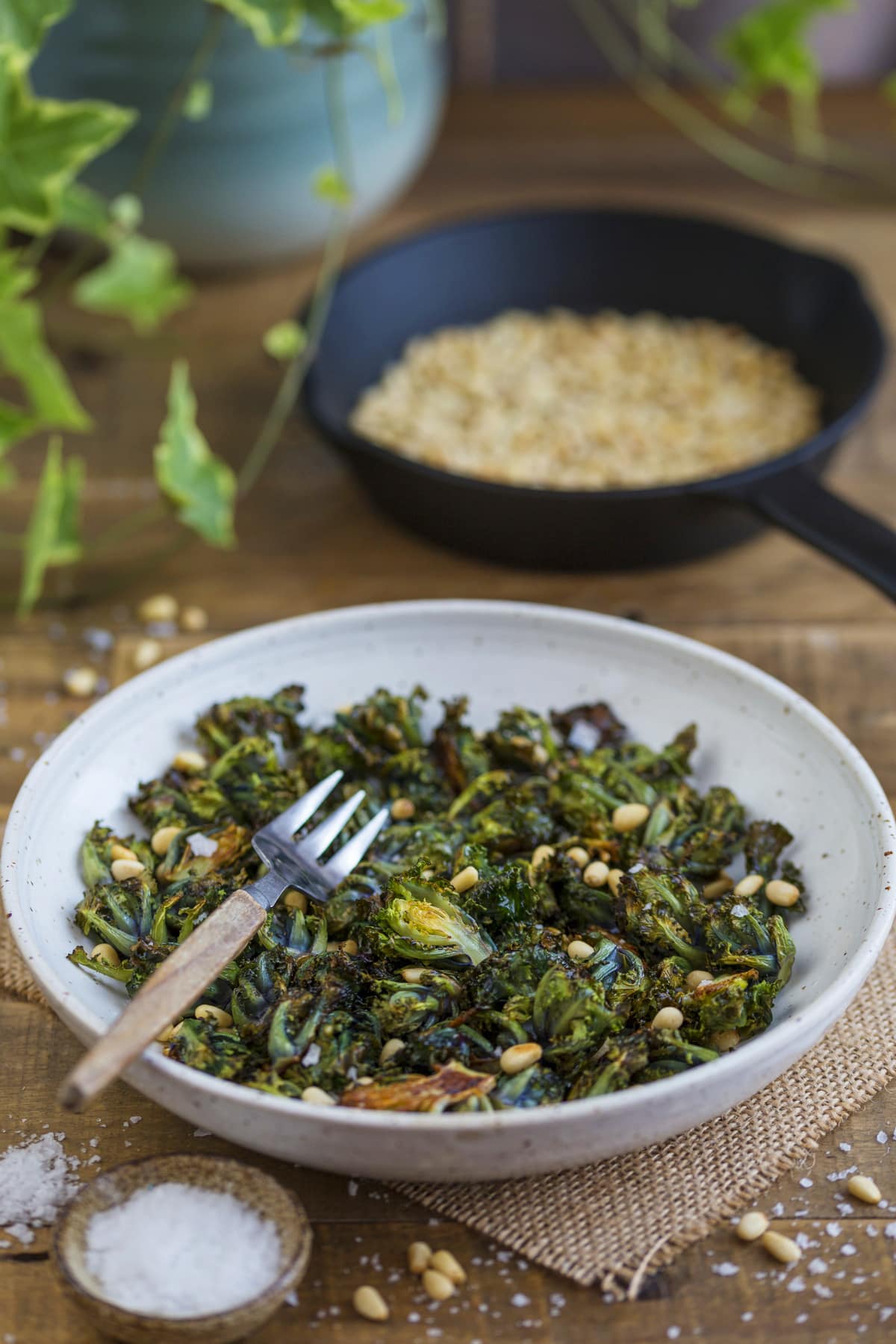 Salad of roasted kalettes with pine nuts.
