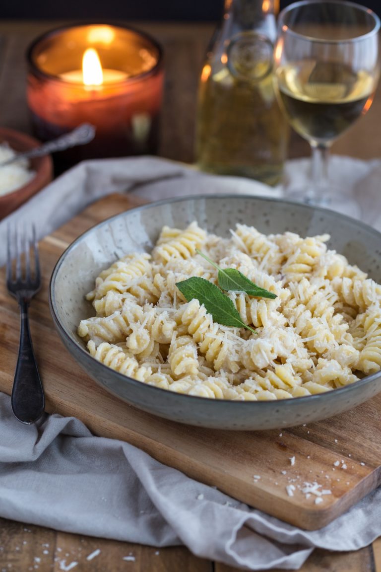 Walnut sauce pasta served in a gray bowl.