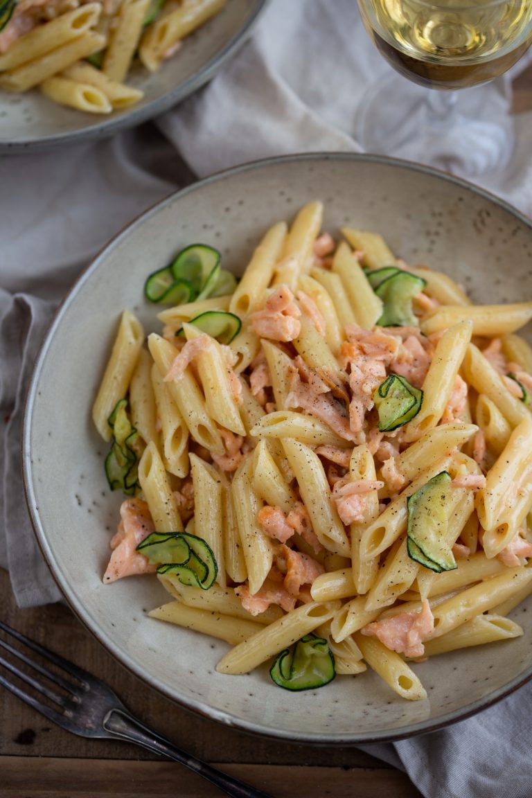 Overlay image of this pasta dish in a beige bowl.