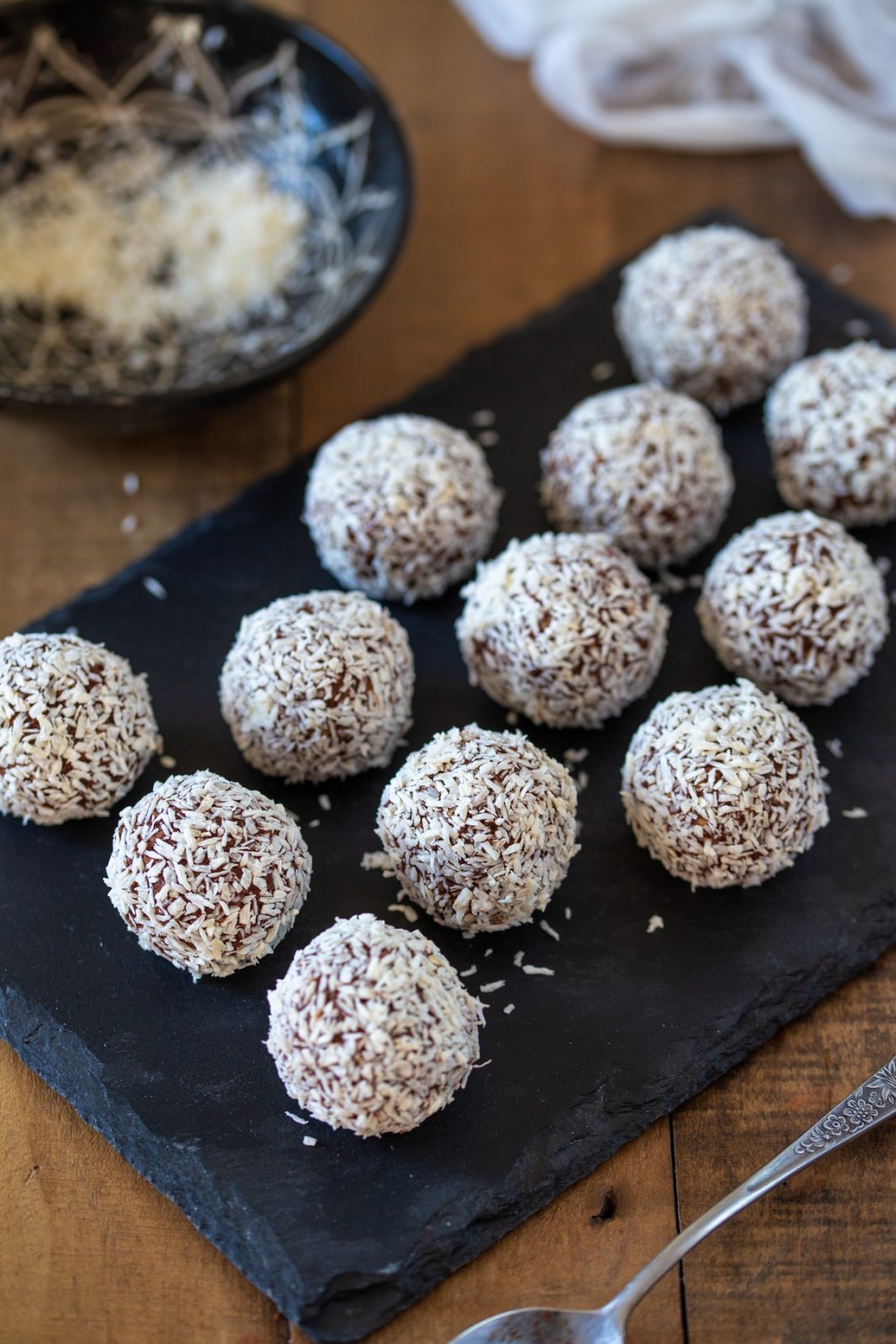 Coconut coated no-bake balls.