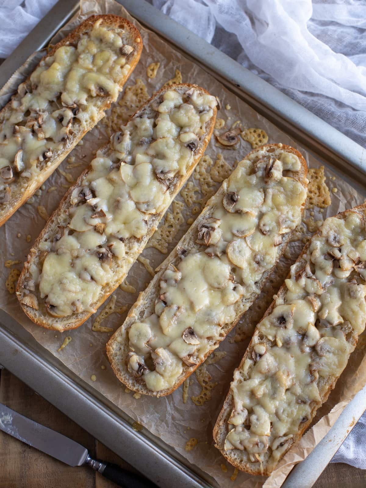 Toasted mushroom and cheese sandwiches.