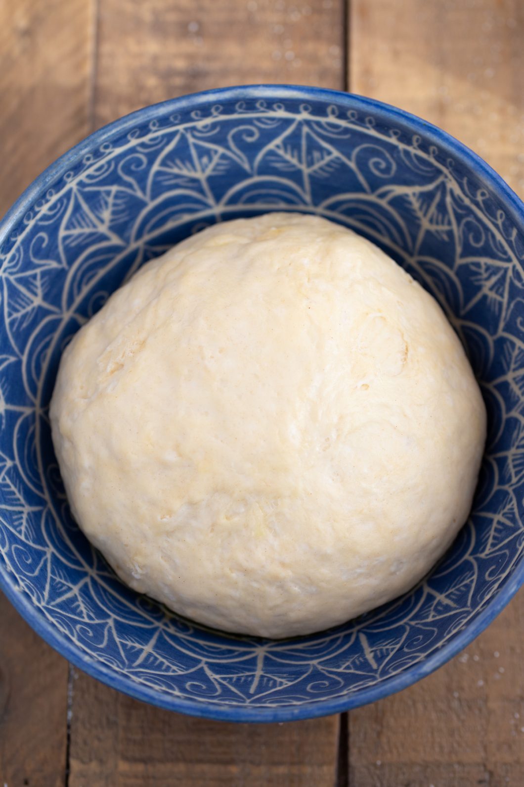 Pizza dough ball doubled in size.