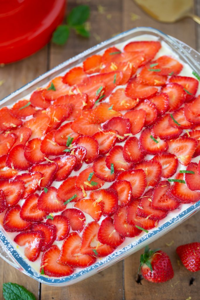 Overhead view of top decoration with sliced strawberries.