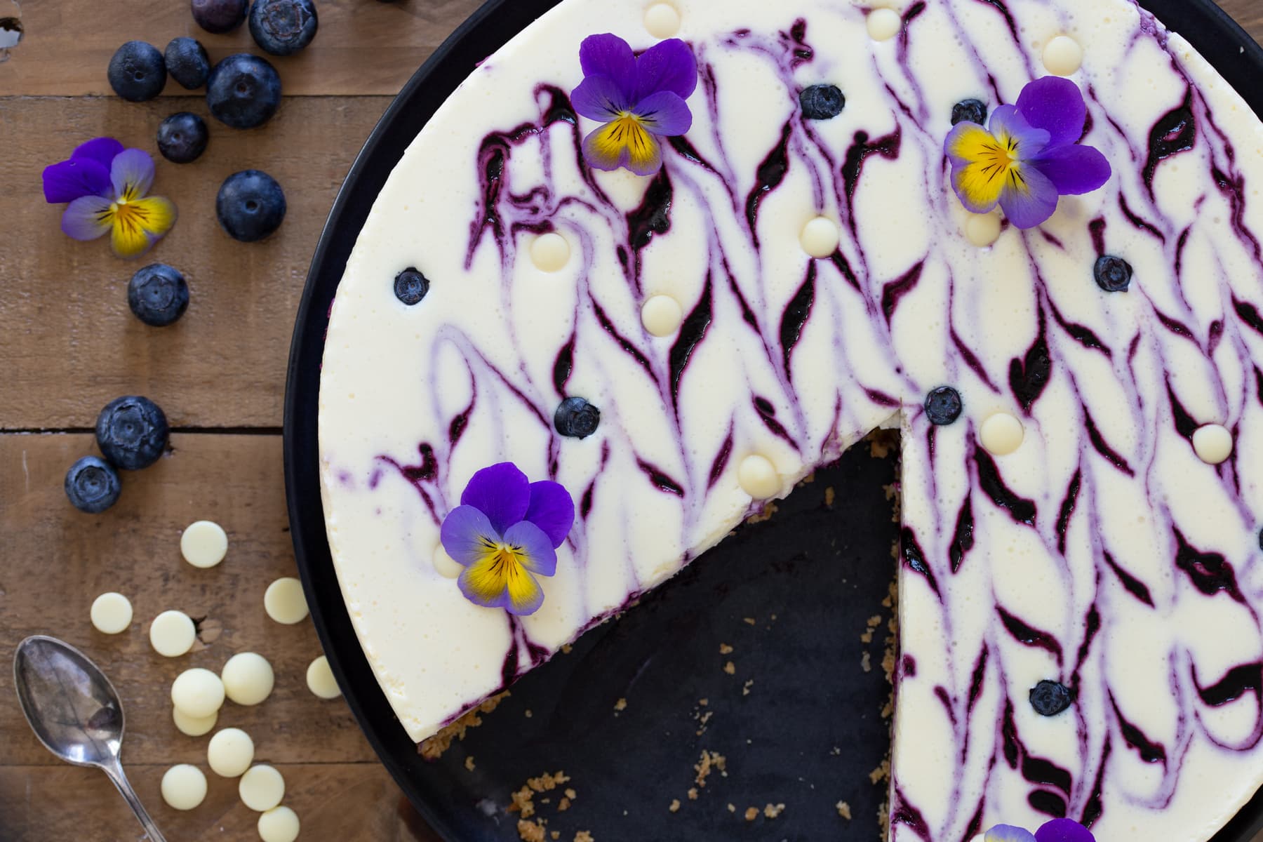 Overhead view of blueberry white chocolate no-bake cheesecake.