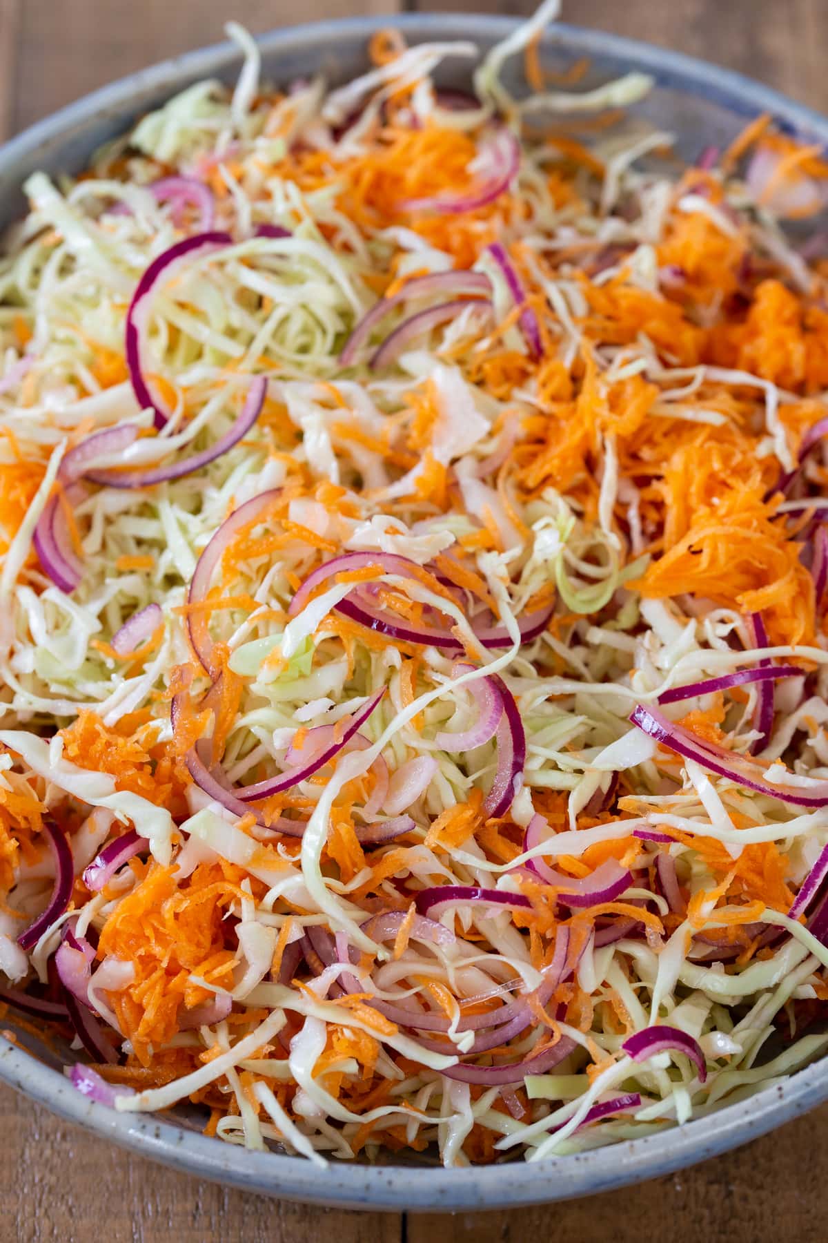 The vegetables are mixed with sugar and vinegar.