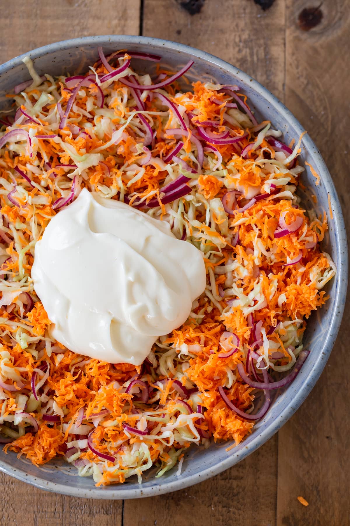 Matonnaise added to seasoned slaw.