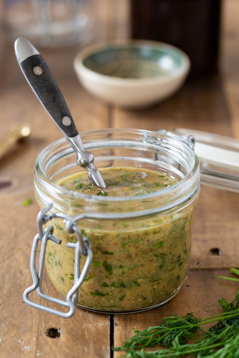 Swedish mustard dill sauce in a small jar.