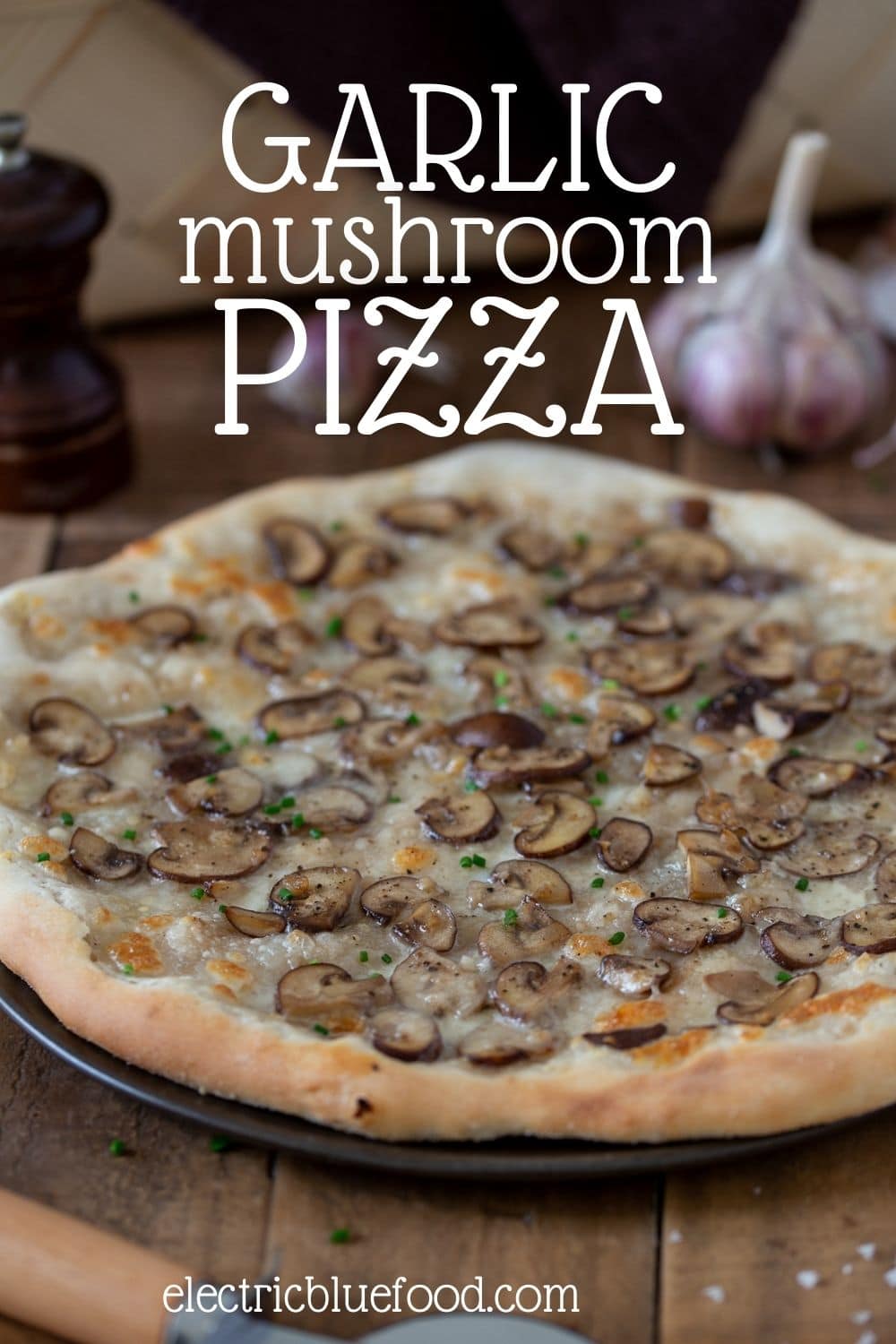 Garlic mushroom pizza bianca topped with mozzarella and garlic mushrooms sautéed in butter.