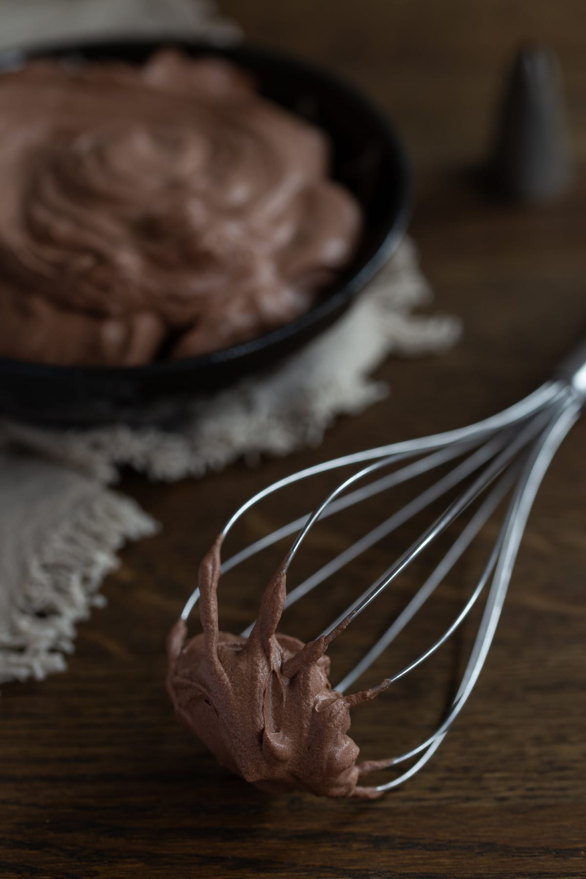 Hand whisk used to whip cocoa cream.