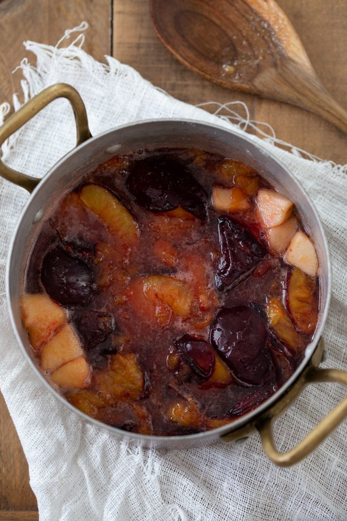 Cooked plums and apples.