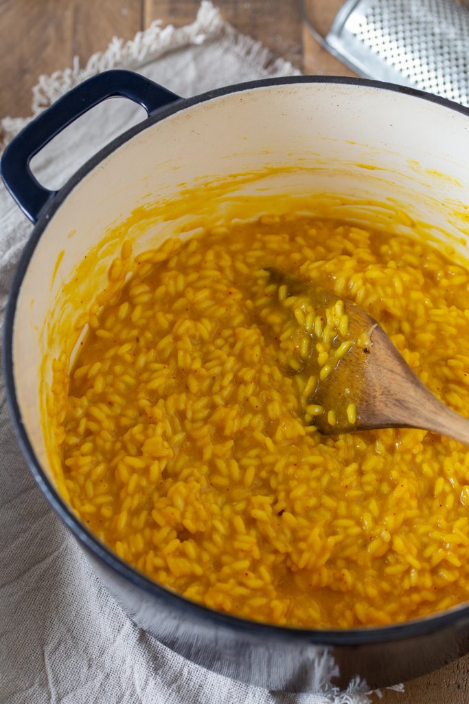 The creamy texture of saffron risotto.