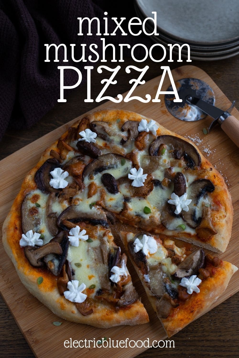Mixed mushroom pizza with goat cheese swirls is a delicious vegetarian pizza that features 4 different types of mushrooms and a cute finish with piped fresh goat cheese.