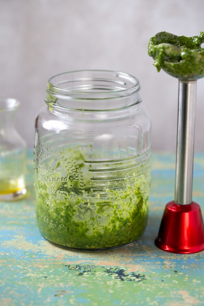 Pesto made in a jar with an immersion blender.