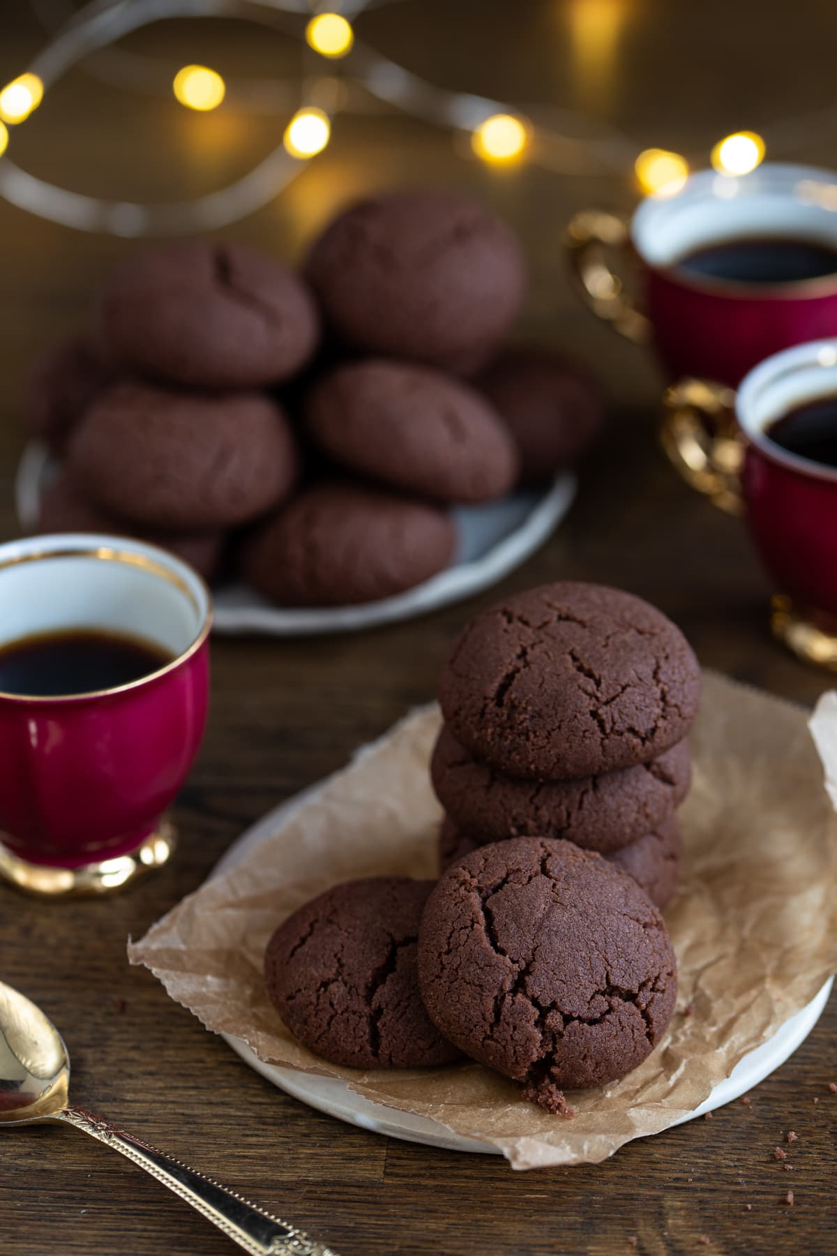 Melt-In-Your-Mouth Chocolate Cookies on a small plate lined with baking paper.