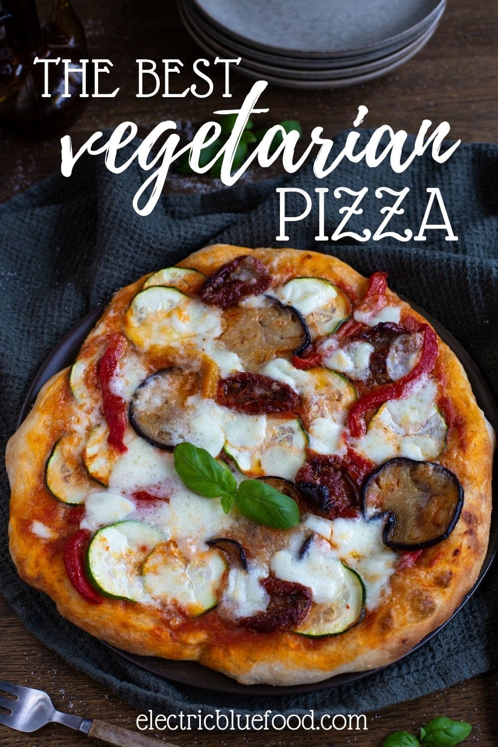 Pizza ortolana with ggplant, zucchini, roasted peppers, sun-dried tomatoes and buffalo mozzarella is the best vegetarian pizza you will try.