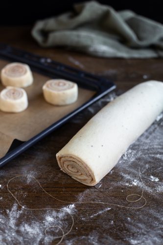 Rolled up cinnamon roll dough.