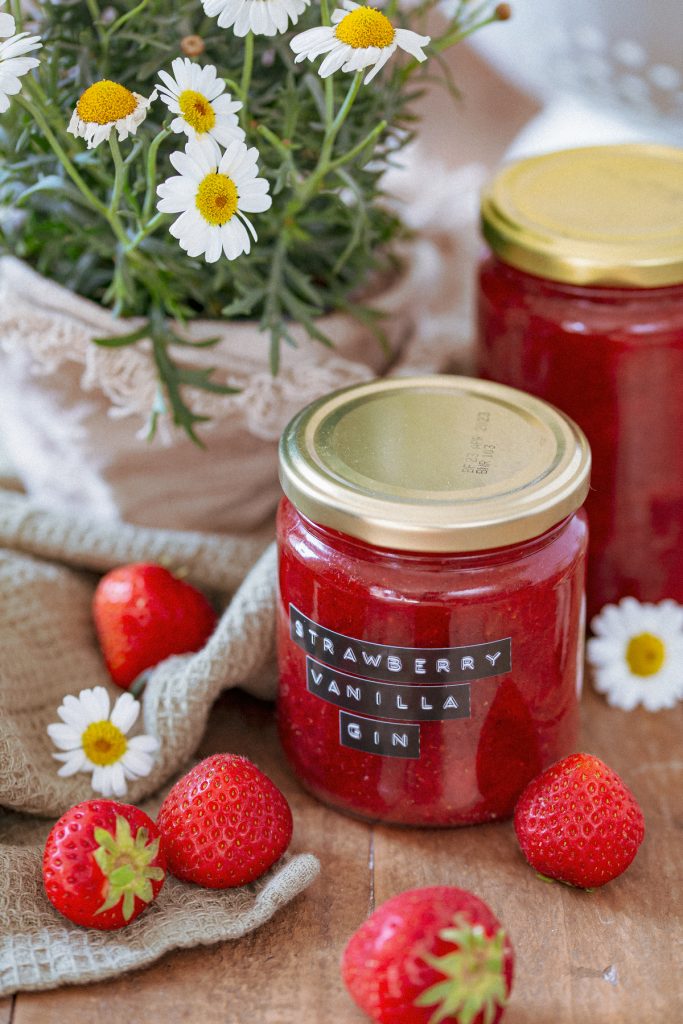 Strawberry and gin jam in a jar and on bread.