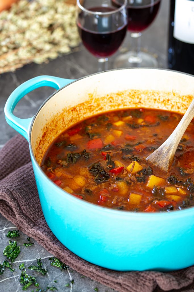 Dutch oven full of soup.