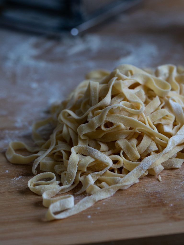 Closeup of handmade fettuccine pasta from scratch.